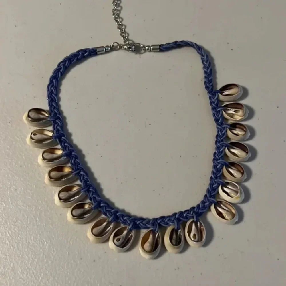 Cowrie Sea Shell Necklace on Blue Braided Cord Silvertone clasp w/ extender NWT